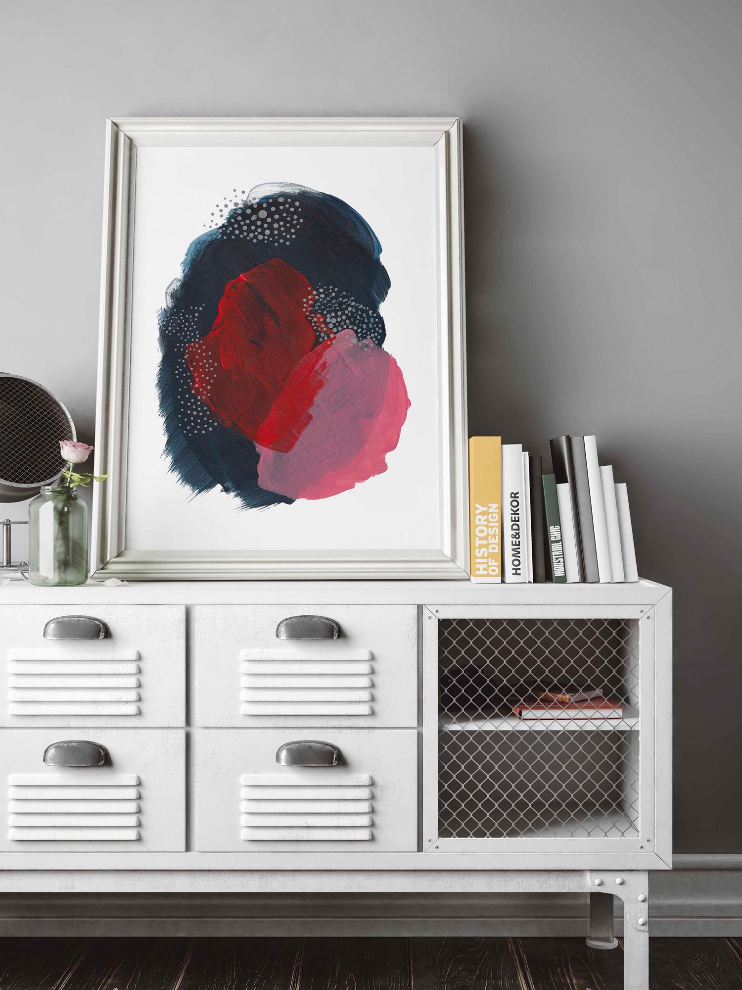 Abstract Art Print in a white frame on a coffee table by Adri Luna Studio